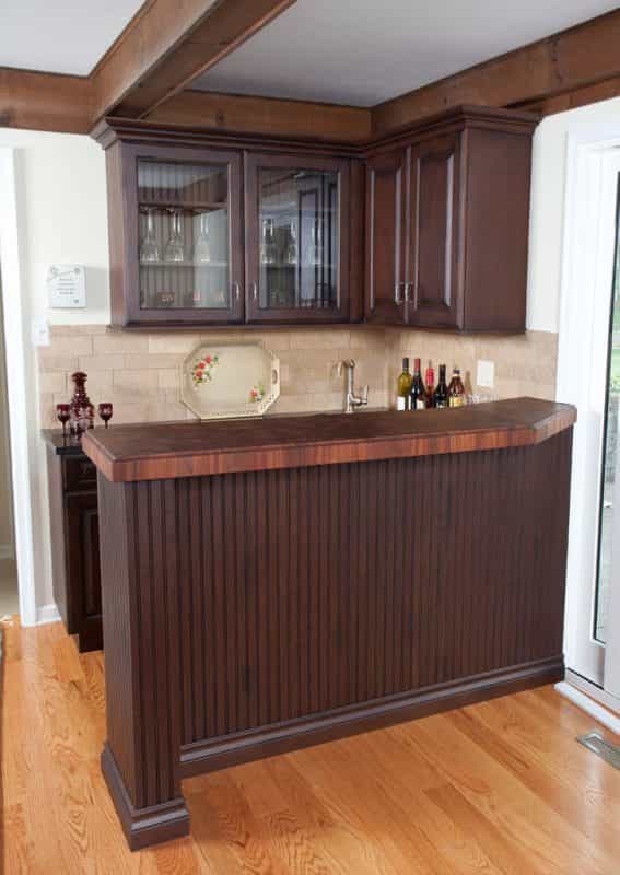 A Grothouse wood countertop completes the look of this Yardley, PA home’s bar.